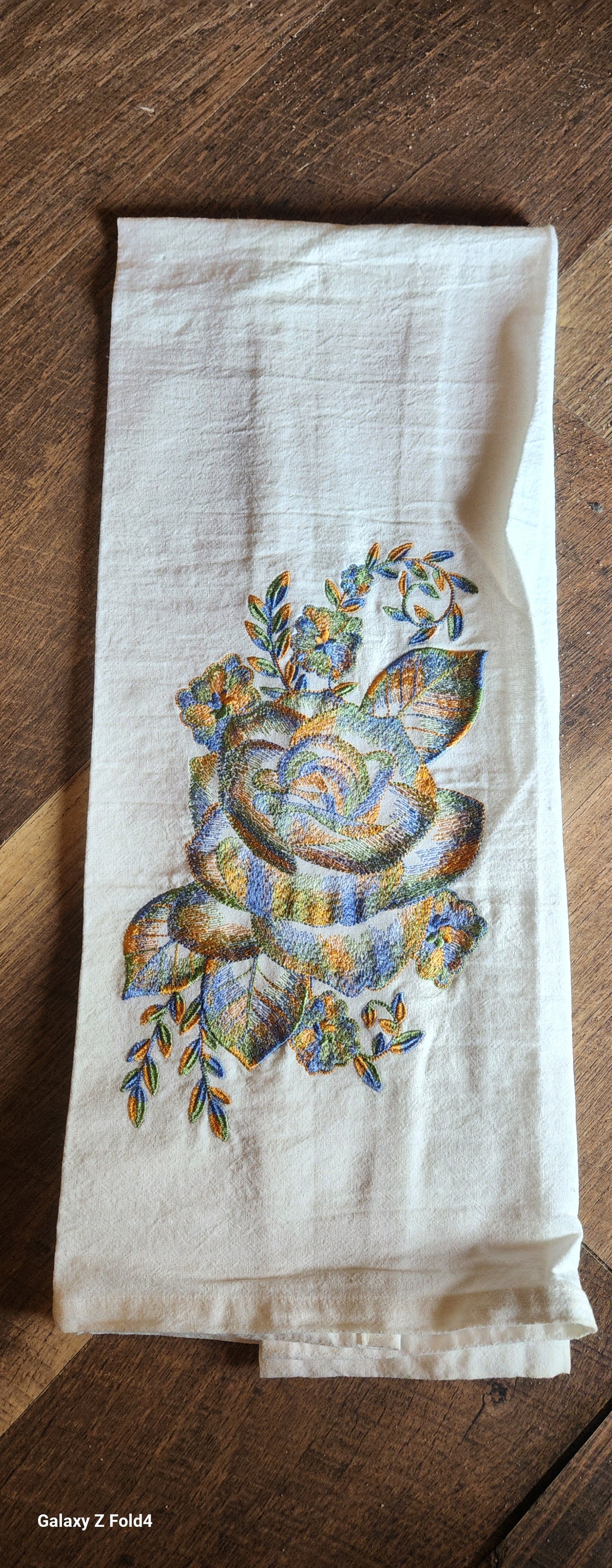 Embroidered Tea Towel with a Rose Motif in Variegated Thread