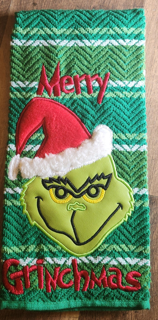 Embroidered "Merry Grinchmas" with a Mean One Kitchen Towel